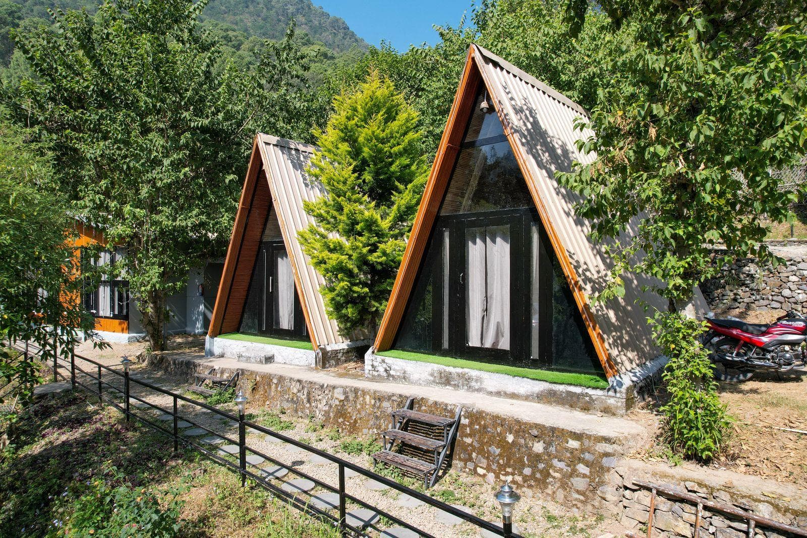 Iconic A-Frame pool-side cottage at Arahnyam Resort